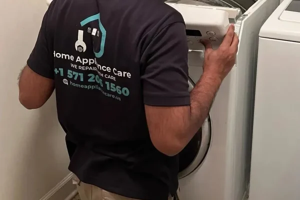 Dryer Repair Service – Home Appliance Care Our technician is repairing the dryer.